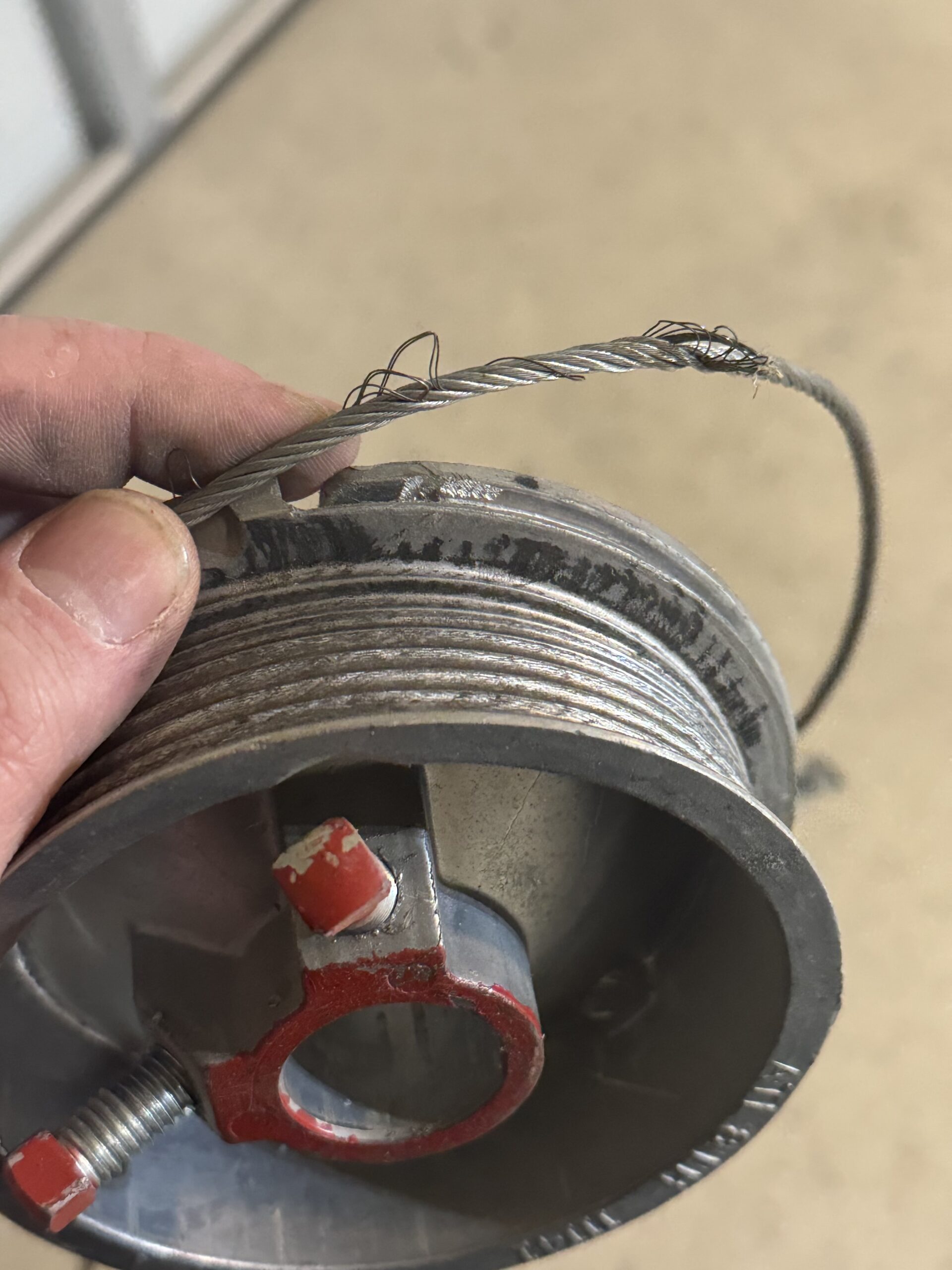 Garage door cable repair in progress — Direct Service Little Rock AR