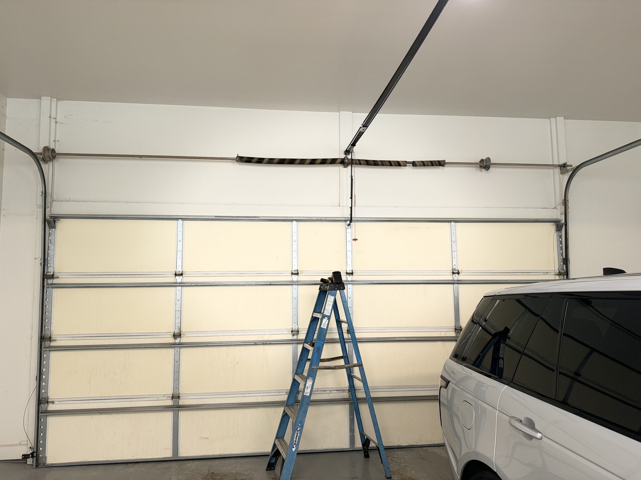 High-lift garage door track conversion — Direct Service Little Rock AR