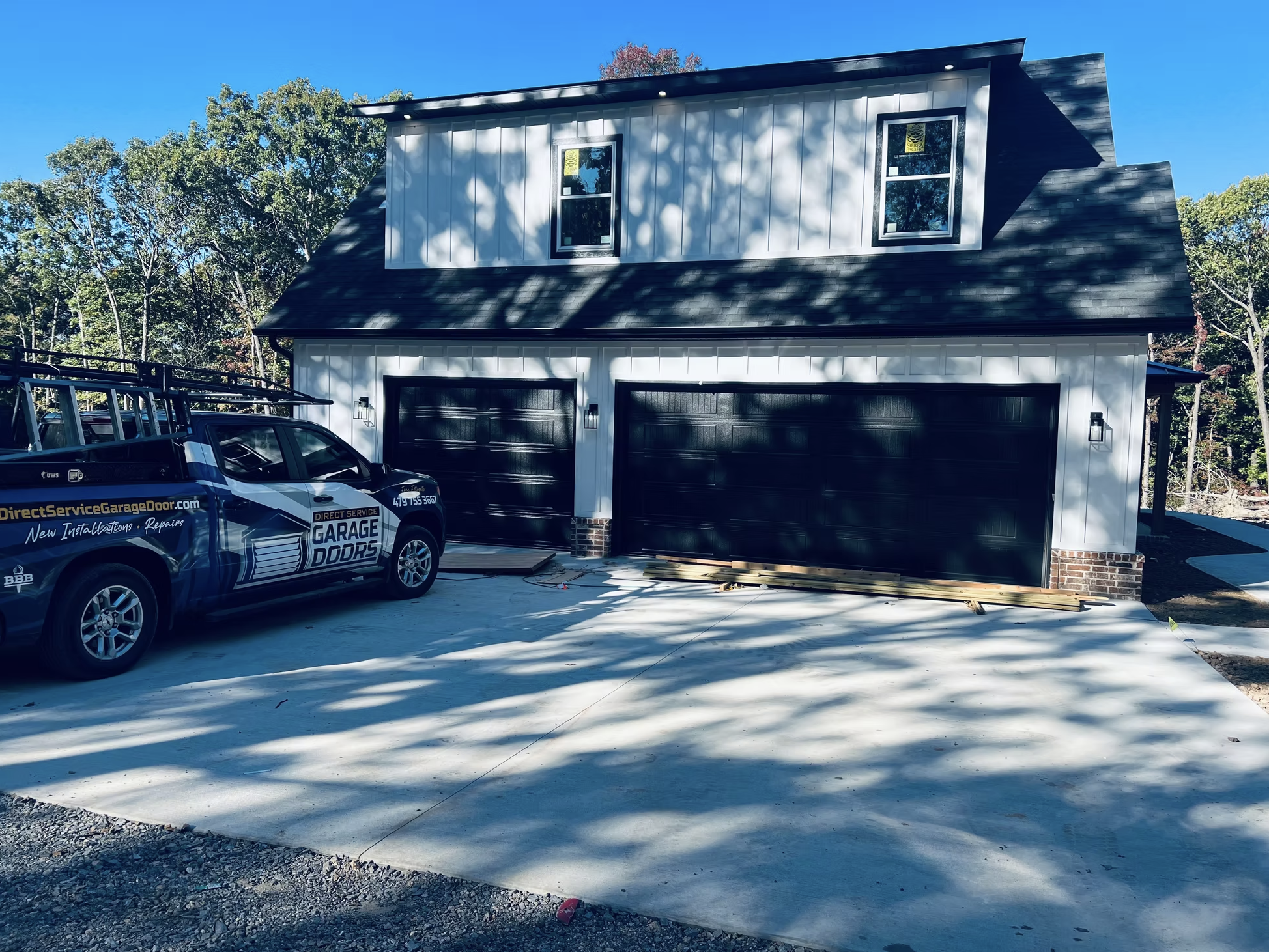 Wood overlay garage door new home installation