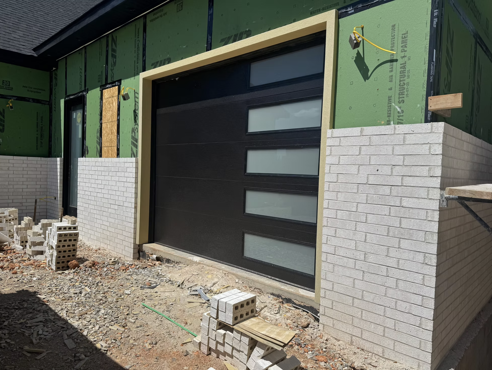 Plank style garage door builder install