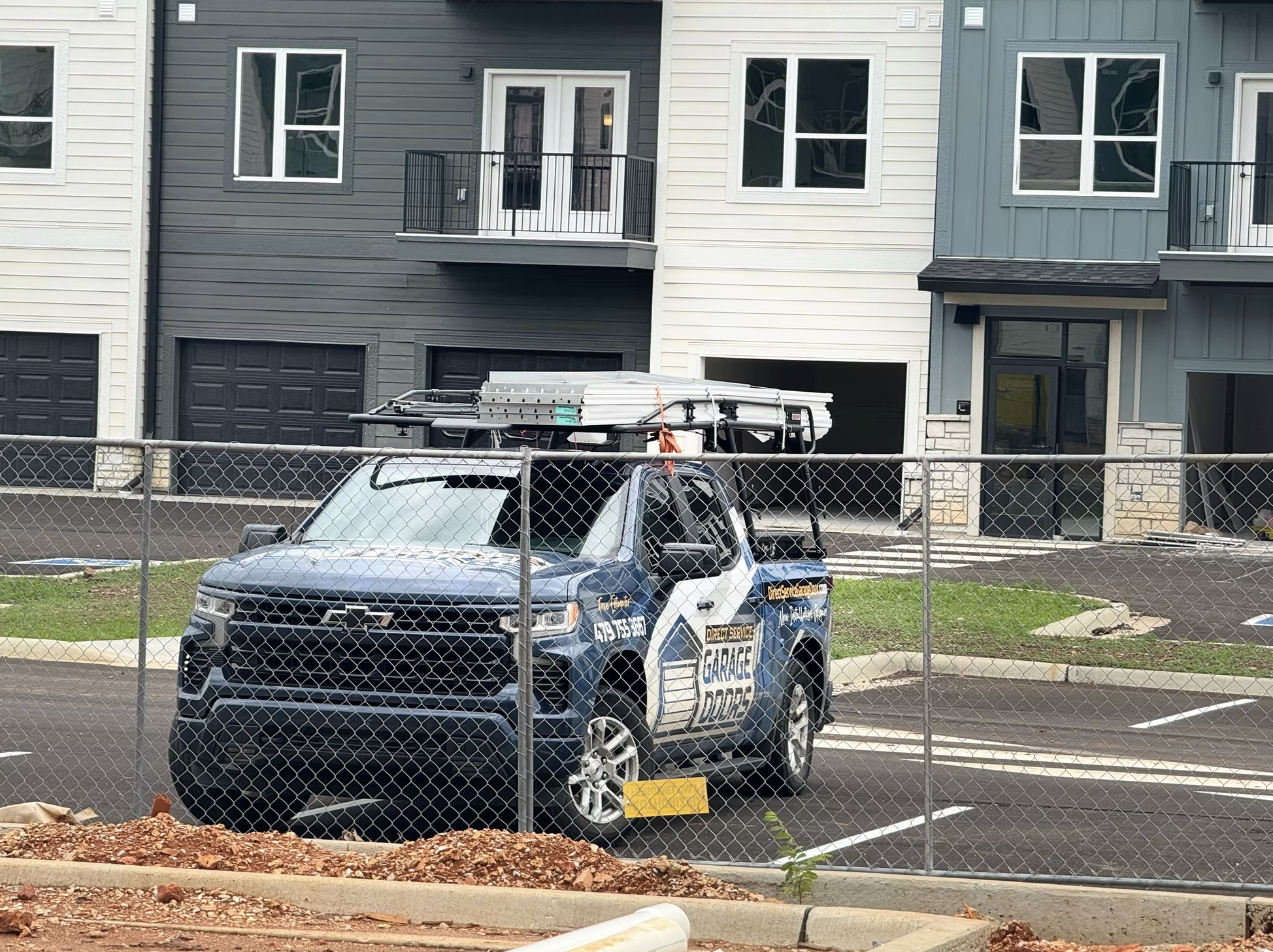 Insulated steel garage door builder installation