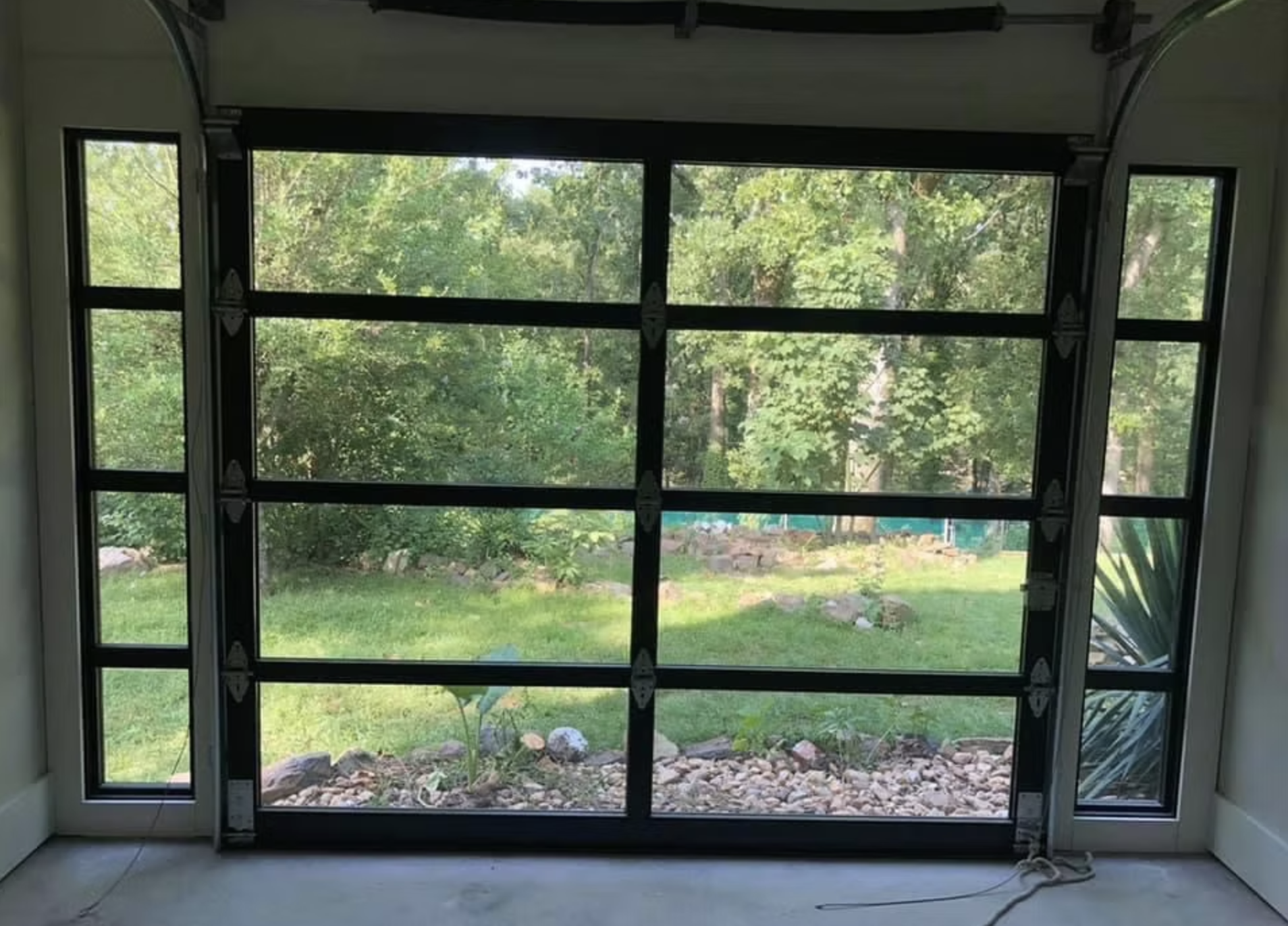 Full view glass garage door new construction