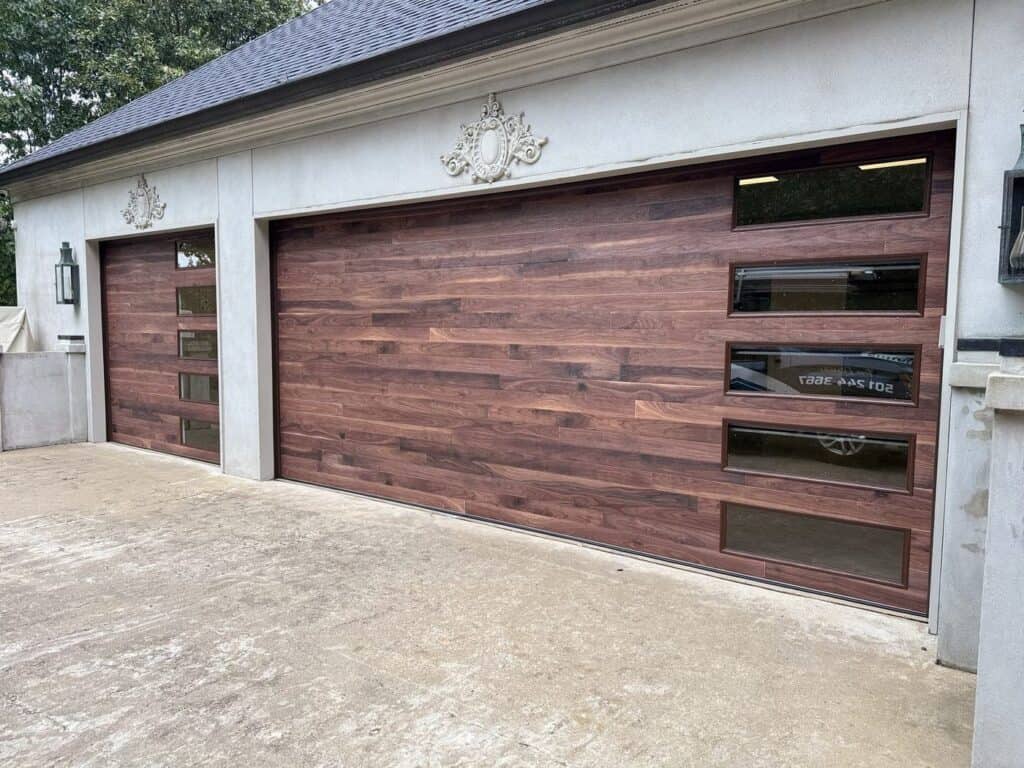 Walnut wood-look modern garage doors with side windows installed by Direct Service Garage Doors